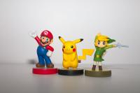 Trois figurines: Mario, Pikachu et Link